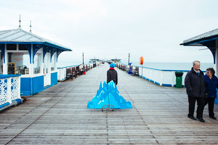 ailie pulling iceberg down pier