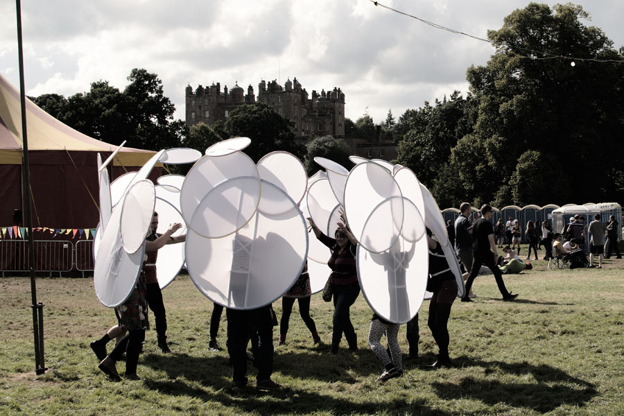 people pavillion surrounds audience at electric fields